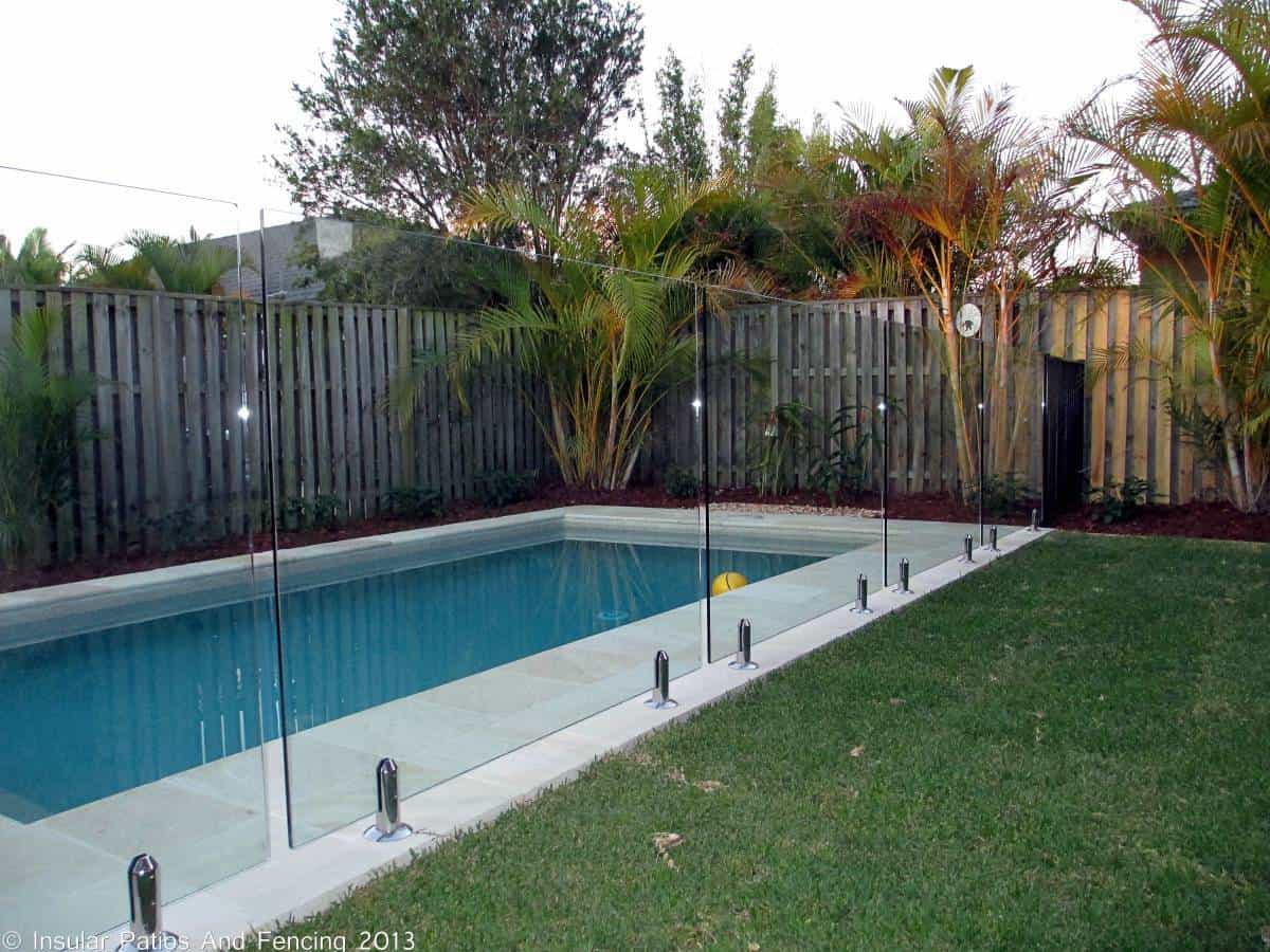 semi inground pool with fence